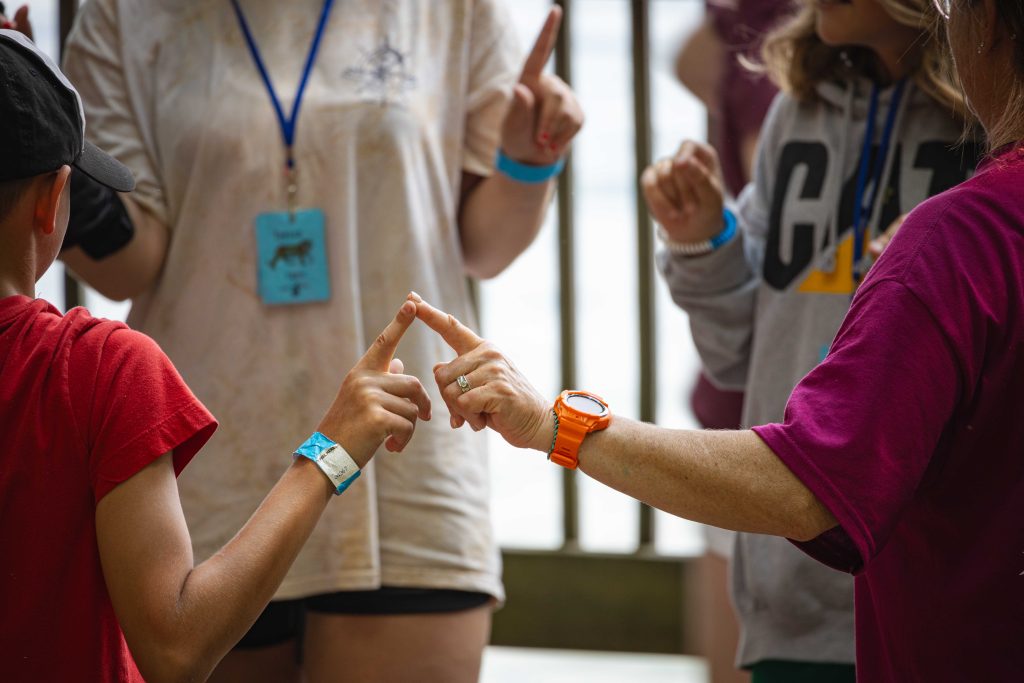 Camp Courage counselors and campers participate in a fun activity.